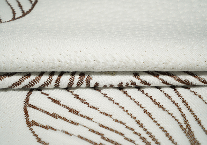 Knitted fabric is made by knitting with tiny needles to create a continuous loop